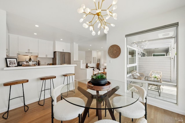 100 Lucky Dr Unit 109, Corte Madera, CA 94925 - dining space with light wood-type flooring, baseboards, a chandelier, and recessed lighting