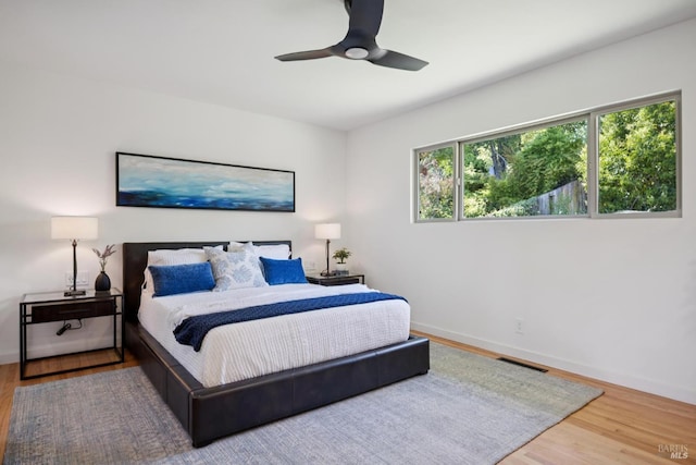 594 Tanbark Ter, San Rafael, CA 94903 - bedroom with wood finished floors, baseboards, and ceiling fan