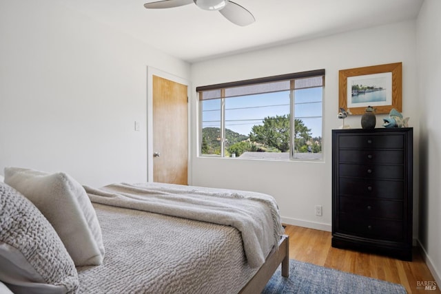 594 Tanbark Ter, San Rafael, CA 94903 - bedroom with wood finished floors, baseboards, and ceiling fan