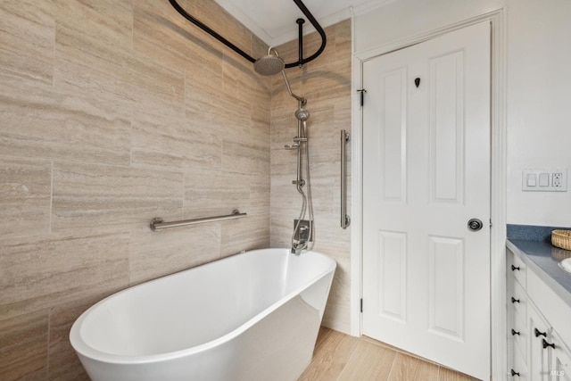 16 Tradewind Psge, Corte Madera, CA 94925 - bathroom featuring a freestanding bath, tiled shower, vanity, and wood finished floors