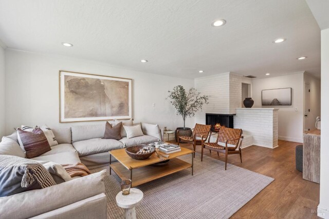 16 Tradewind Psge, Corte Madera, CA 94925 - living room with recessed lighting, wood finished floors, a fireplace, and baseboards
