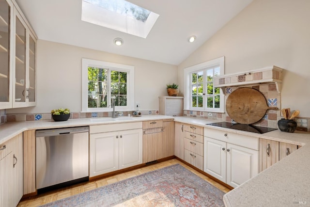 304 Laurel Way, Mill Valley, CA 94941 - kitchen with dishwasher, black electric stovetop, a skylight, vaulted ceiling, and light countertops