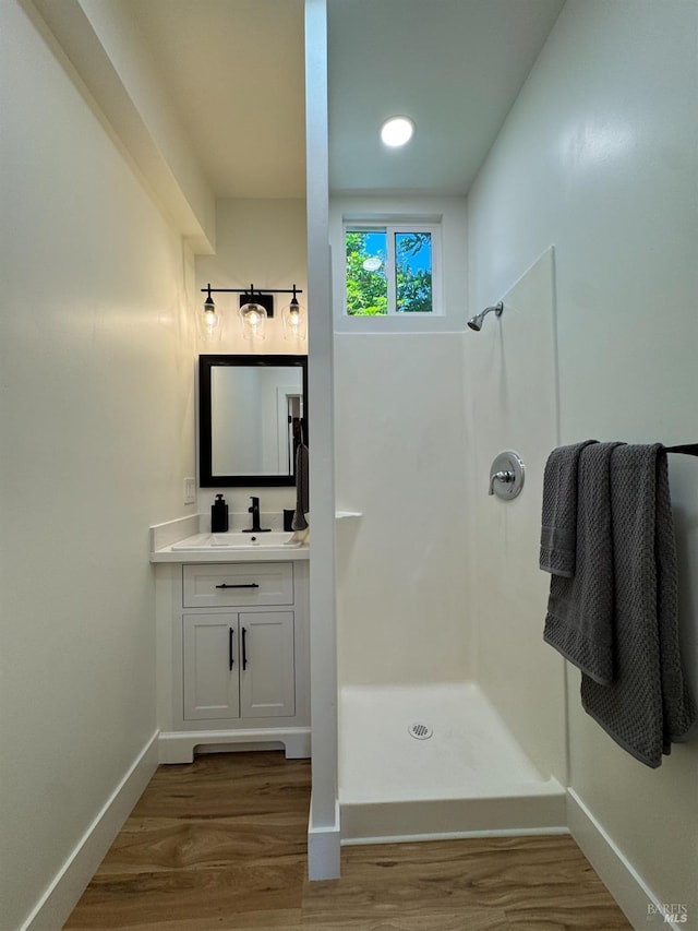 1529 San Anselmo Ave Unit A B, San Anselmo, CA 94960 - full bath featuring a shower, vanity, wood finished floors, and baseboards