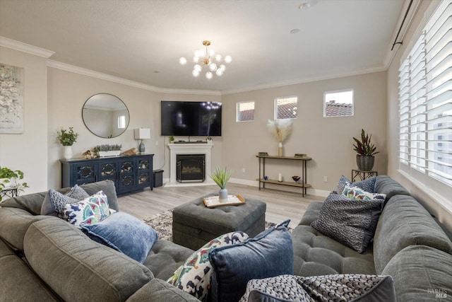5340 Discovery Way, Fairfield, CA 94533 - living room with light wood-style floors, crown molding, a chandelier, a fireplace, and baseboards