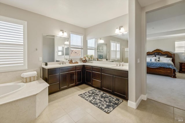 5340 Discovery Way, Fairfield, CA 94533 - ensuite bathroom with double vanity, a garden tub, and tile patterned flooring