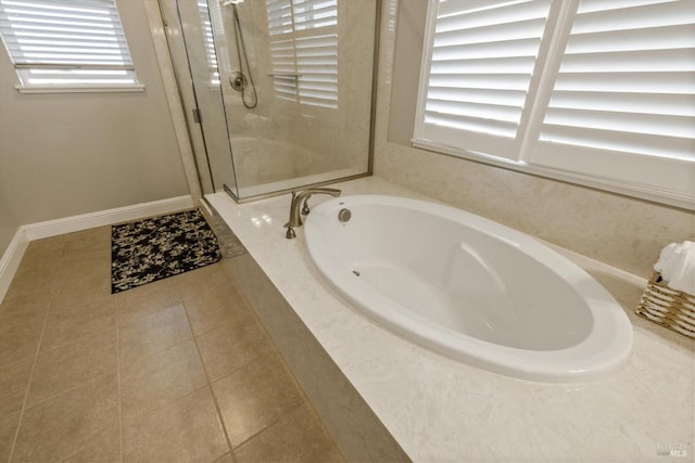 5340 Discovery Way, Fairfield, CA 94533 - full bath with healthy amount of natural light, a bath, a shower stall, and tile patterned flooring