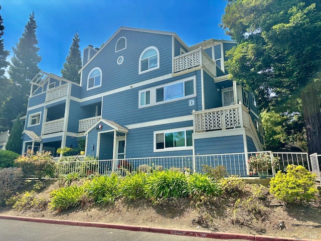 143 Sea Crest Cir, Vallejo, CA 94590 - view of side of property featuring a balcony and a chimney
