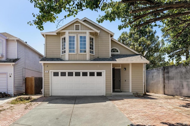 404 Mellowood Ct, Suisun City, CA 94585 - traditional-style home featuring concrete driveway, a garage, board and batten siding, and a shingled roof