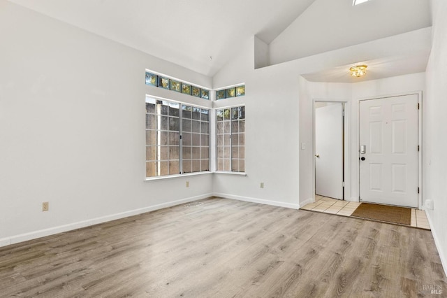 404 Mellowood Ct, Suisun City, CA 94585 - spare room with wood finished floors and high vaulted ceiling