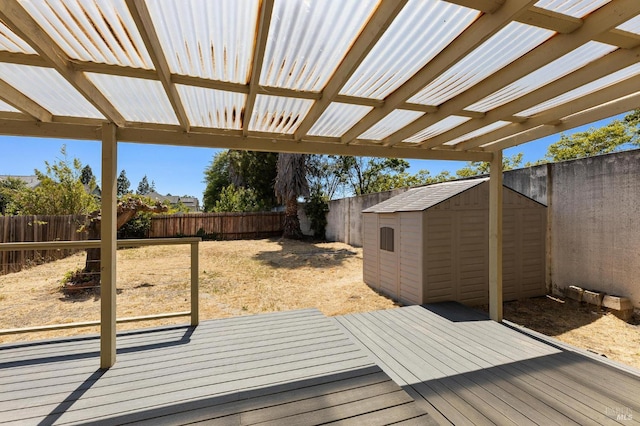 404 Mellowood Ct, Suisun City, CA 94585 - wooden deck featuring a storage unit and a fenced backyard