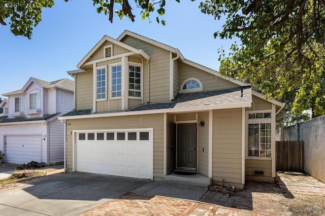 404 Mellowood Ct, Suisun City, CA 94585 - view of front of home featuring concrete driveway, a garage, board and batten siding, and roof with shingles