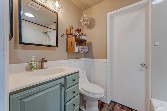 29 Pine Tree Cir, Cotati, CA 94931 - bathroom with vanity, wood finished floors, a shower, and wainscoting