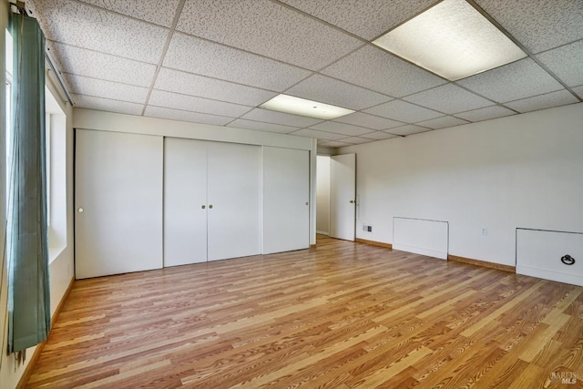 8567 Davona Dr, Dublin, CA 94568 - unfurnished bedroom with light wood-style floors, a drop ceiling, and a closet