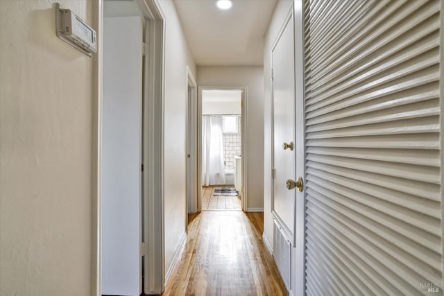 8567 Davona Dr, Dublin, CA 94568 - hallway featuring wood finished floors and recessed lighting