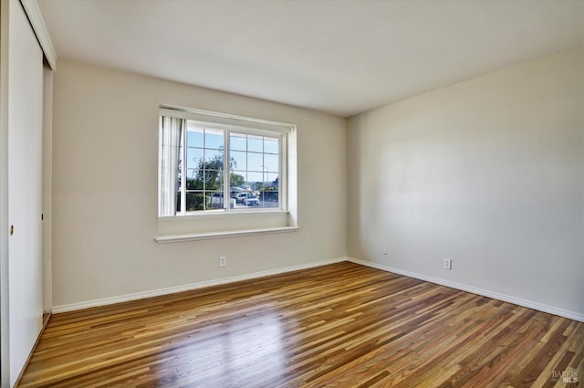 8567 Davona Dr, Dublin, CA 94568 - empty room featuring wood finished floors and baseboards