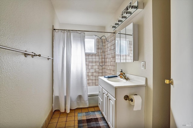 8567 Davona Dr, Dublin, CA 94568 - full bathroom featuring shower / bath combination with curtain, a textured wall, vanity, and tile patterned floors