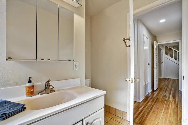 8567 Davona Dr, Dublin, CA 94568 - bathroom featuring vanity, recessed lighting, and wood finished floors