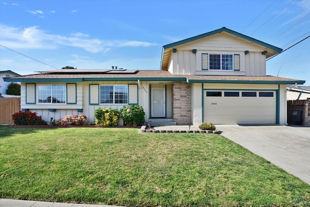 8567 Davona Dr, Dublin, CA 94568 - traditional-style house featuring board and batten siding, driveway, solar panels, and a garage
