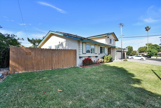 8567 Davona Dr, Dublin, CA 94568 - view of side of property with a garage and concrete driveway