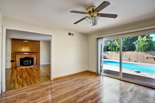 8567 Davona Dr, Dublin, CA 94568 - unfurnished living room featuring wood finished floors and a ceiling fan
