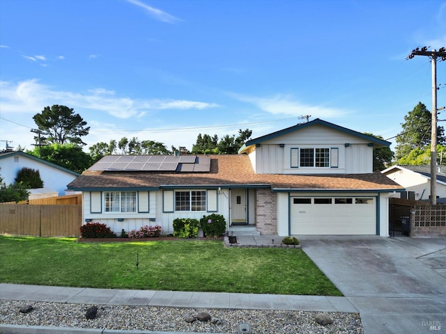8567 Davona Dr, Dublin, CA 94568 - traditional-style home featuring concrete driveway, board and batten siding, roof mounted solar panels, and an attached garage
