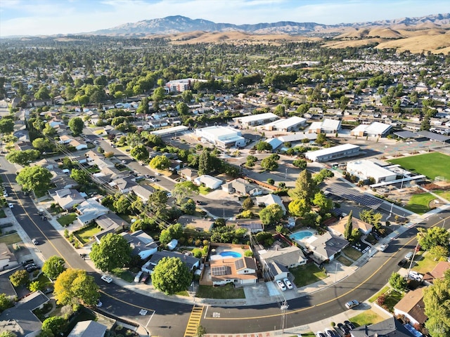 8567 Davona Dr, Dublin, CA 94568 - aerial overview of property's location with a mountainous background