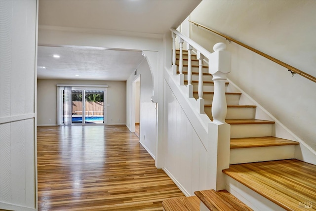 8567 Davona Dr, Dublin, CA 94568 - stairs featuring wood finished floors and recessed lighting
