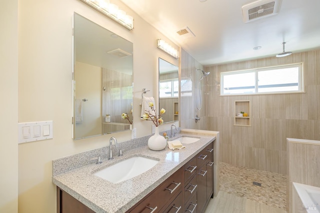 210 San Francisco Blvd, San Anselmo, CA 94960 - bathroom featuring a tile shower, double vanity, and a bathtub
