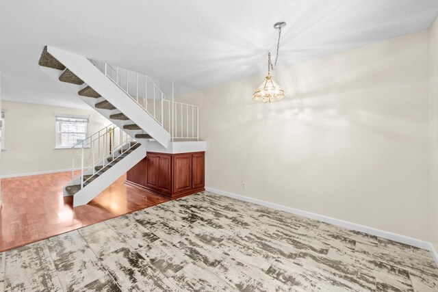 4014 Knoll Top Ct, Carmichael, CA 95608 - unfurnished living room featuring stairway and wood finished floors