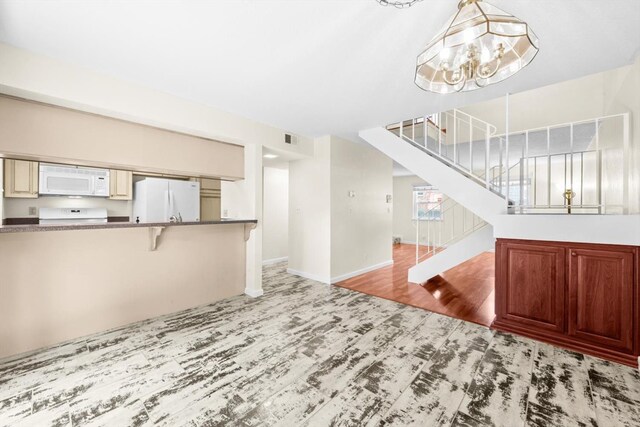 4014 Knoll Top Ct, Carmichael, CA 95608 - unfurnished living room featuring a chandelier and stairway