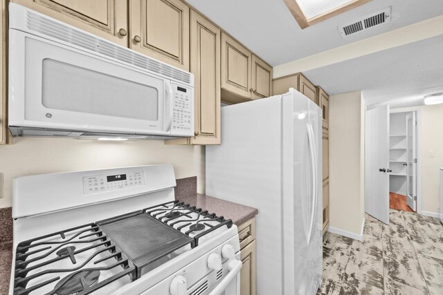 4014 Knoll Top Ct, Carmichael, CA 95608 - kitchen featuring white appliances and dark countertops