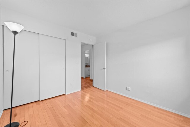 4014 Knoll Top Ct, Carmichael, CA 95608 - unfurnished bedroom with light wood-type flooring and a closet