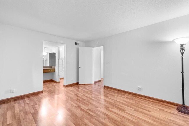 4014 Knoll Top Ct, Carmichael, CA 95608 - unfurnished bedroom with light wood-type flooring and ensuite bath