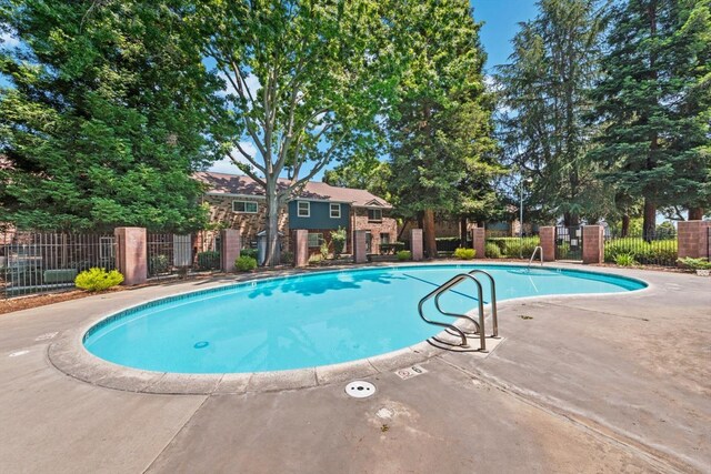 4014 Knoll Top Ct, Carmichael, CA 95608 - view of swimming pool featuring a patio area