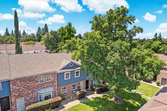 4014 Knoll Top Ct, Carmichael, CA 95608 - view of front of house with brick siding and a front yard
