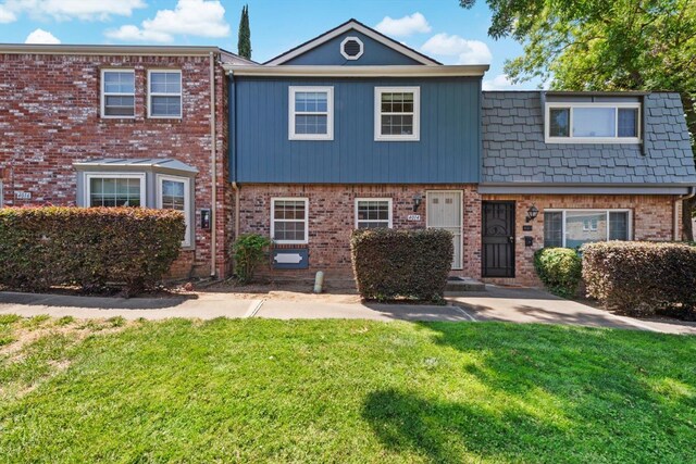 4014 Knoll Top Ct, Carmichael, CA 95608 - view of property with a front lawn and brick siding