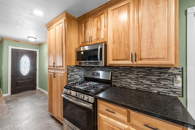 216 Walnut St, Suisun City, CA 94585 - kitchen featuring stainless steel appliances, backsplash, ornamental molding, and light tile patterned floors