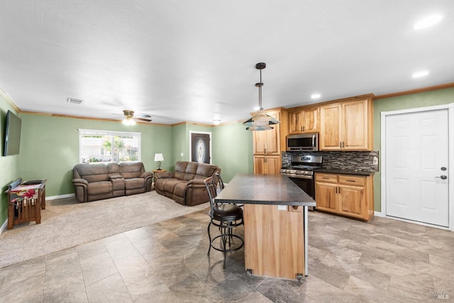 216 Walnut St, Suisun City, CA 94585 - kitchen with appliances with stainless steel finishes, dark countertops, crown molding, a breakfast bar, and backsplash