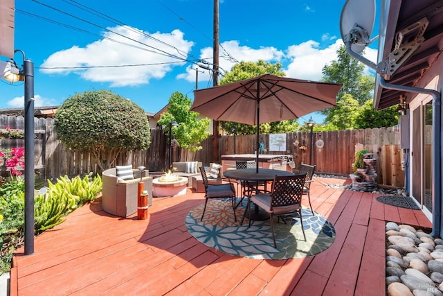 216 Walnut St, Suisun City, CA 94585 - deck featuring an outdoor fire pit, outdoor dining area, and a fenced backyard