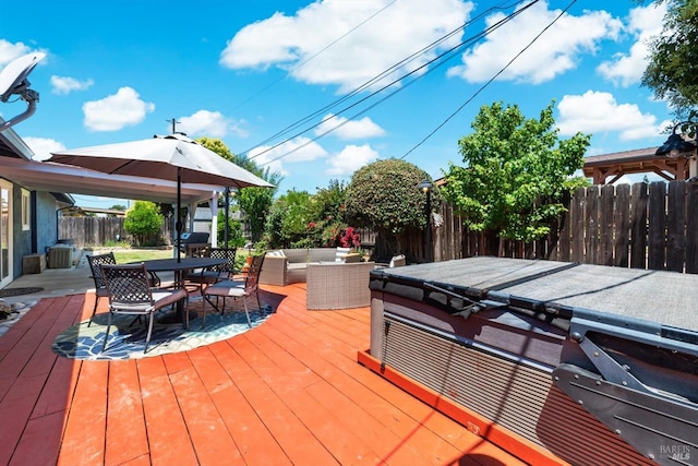 216 Walnut St, Suisun City, CA 94585 - wooden terrace with an outdoor hangout area, a fenced backyard, and outdoor dining space