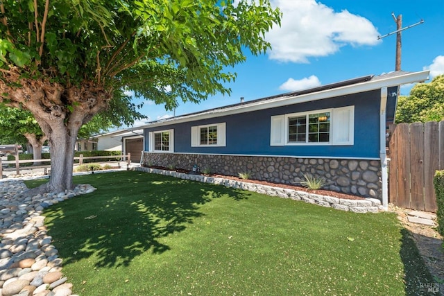 216 Walnut St, Suisun City, CA 94585 - single story home with an attached garage, stucco siding, and stone siding