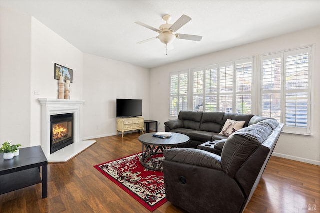 2131 Hailstone Way, Antioch, CA 94509 - living room with ceiling fan, a glass covered fireplace, and dark wood-style floors