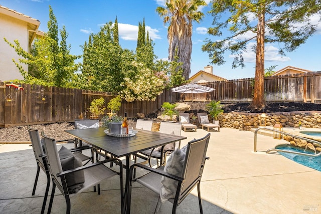 2131 Hailstone Way, Antioch, CA 94509 - fenced backyard with an outdoor hot tub, outdoor dining space, and a patio