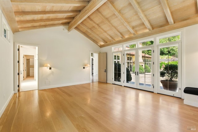 11018 Moonshine Rd, Sebastopol, CA 95472 - unfurnished living room with light wood-style flooring, a wooden ceiling with exposed beams, french doors, and high vaulted ceiling