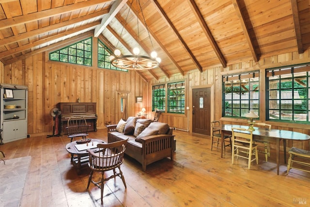 11018 Moonshine Rd, Sebastopol, CA 95472 - living room with hardwood / wood-style floors, wood ceiling, a chandelier, and wooden walls