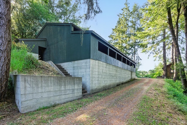 11018 Moonshine Rd, Sebastopol, CA 95472 - view of property exterior featuring concrete block siding and stairs