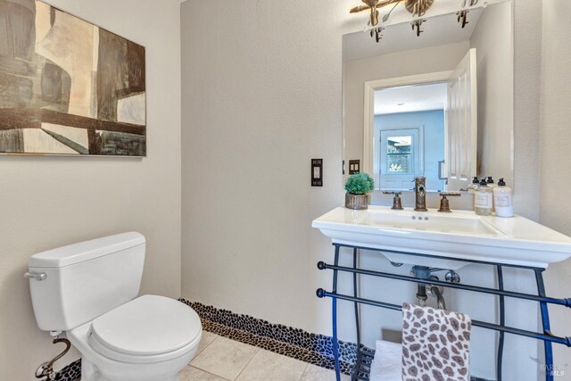 1130 W 9th St, Benicia, CA 94510 - half bathroom with toilet and tile patterned flooring