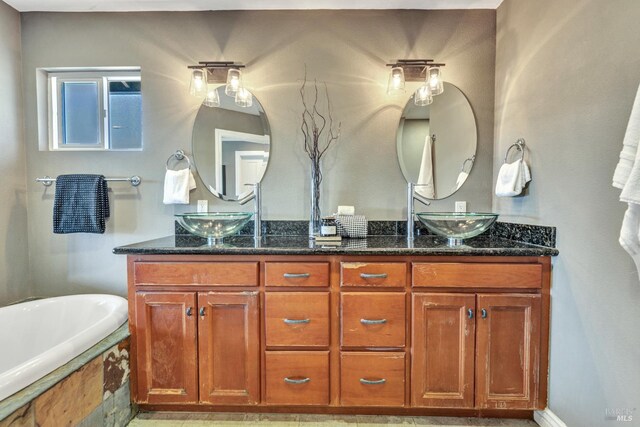 1130 W 9th St, Benicia, CA 94510 - bathroom featuring double vanity and tiled bath