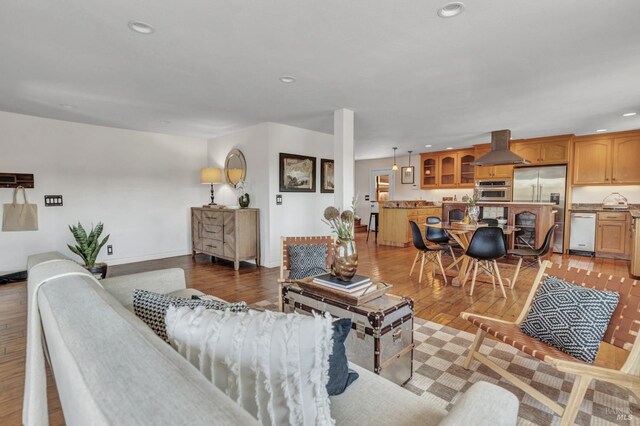 1130 W 9th St, Benicia, CA 94510 - living area featuring light wood finished floors and recessed lighting