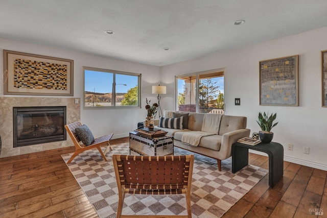 1130 W 9th St, Benicia, CA 94510 - living room with hardwood / wood-style flooring, healthy amount of natural light, a fireplace, and recessed lighting